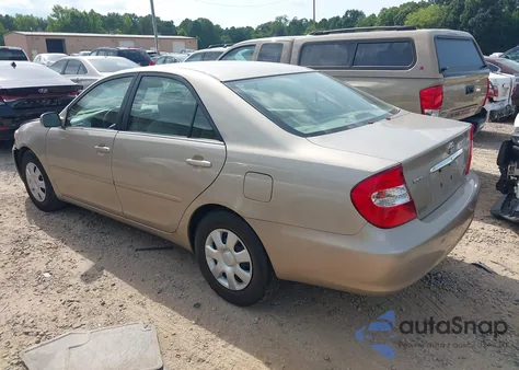 2004 Toyota Camry Le z USA, uszkodzony, nr VIN 4T1BE32K04U320925